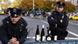 New York policemen pose with bottles of German wine New York policemen pose with bottles of German wine