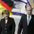 German Chancellor Angela Merkel and Israel's Prime Minister Ehud Olmert
