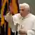Pope Benedict XVI delivers his blessing during his weekly general audience in the Paul VI hall at the Vatican