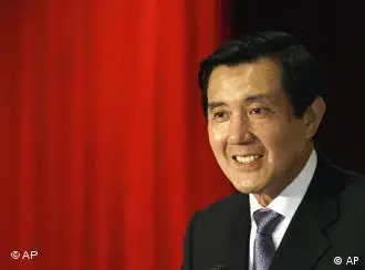 Taiwan's president-elect Ma Ying-jeou of opposition Nationalist Party smiles during a press conference a day after the presidential election in Taipei, Taiwan Sunday, March 23, 2008. Ma said Sunday he had no immediate plans to visit China and would work to fulfill his campaign pledge to improve relations with the communist neighbor, starting direct flights, allowing more Chinese tourists to visit and helping the island's financial industry go to the mainland. (AP Photo/Vincent Yu)