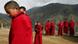 Tibetan nuns stand outside the Taibaling Nunnery at Shusong Village in the mountains about 50 kilometers (31 miles) from the border with Tibet, in China's southwest Yunnan province Tuesday March 25, 2008. The nunnery was rebuilt on the site of a 300-year-old monastery after the monastery and the nearby nunnery were destroyed during China's 1966-76 Cultural Revolution. Some 130 Tibetan nuns currently study at the nunnery. (AP Photo/Greg Baker) Tibetan nuns stand outside the Taibaling Nunnery at Shusong Village in the mountains about 50 kilometers (31 miles) from the border with Tibet, in China's southwest Yunnan province Tuesday March 25, 2008. The nunnery was rebuilt on the site of a 300-year-old monastery after the monastery and the nearby nunnery were destroyed during China's 1966-76 Cultural Revolution. Some 130 Tibetan nuns currently study at the nunnery. (AP Photo/Greg Baker)