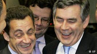 Sarkozy shares a laugh with Brown during an EU summit in Brussels on Dec. 14, 2007
