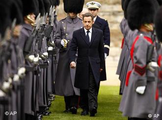 Sarkozy inspects the troops during a state visit at Windsor Castle