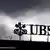 UBS sign and cloudy sky