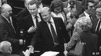 Schmidt is congratulated after the no-confidence vote