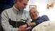 young German with elderly Jewish survivor of Holocaust young German with elderly Jewish survivor of Holocaust