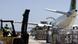A UN worker in Italy loads a plane with humanitarian supplies headed for Burma A UN worker in Italy loads a plane with humanitarian supplies headed for Burma