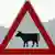 Prometni znak zabrane sa kravom