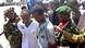 Union of Islamic Courts (UIC) soldiers from the anti-piracy unit escort Somali nationals accused of hijacking a vessel in the port of Mogadishu, Somalia Union of Islamic Courts (UIC) soldiers from the anti-piracy unit escort Somali nationals accused of hijacking a vessel in the port of Mogadishu, Somalia