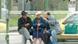 Three pensioners sitting at a bus stop Three pensioners sitting at a bus stop