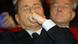 Berlusconi listens with his eyes closed Berlusconi listens with his eyes closed