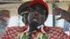 Mann in buntem Anzug (20.6.08, Bulawayo - Simbabwe, Quelle: AP) Mann in buntem Anzug (20.6.08, Bulawayo - Simbabwe, Quelle: AP)