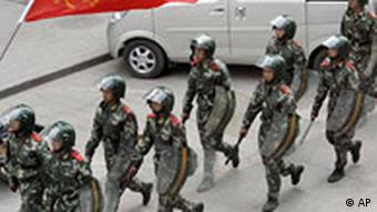 Chinese paramilitary police officers patrol in Weng'an county of Guizhou province, China
