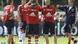 Juergen Klinsmann, new coach of German first soccer division Bundesliga team FC Bayern Munich, center, walks beside of players during his first trainings session Juergen Klinsmann, new coach of German first soccer division Bundesliga team FC Bayern Munich, center, walks beside of players during his first trainings session