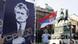 Supporters of ex-Bosnian Serb war crimes suspect Radovan Karadzic hold up pictures of him, during a protest in Belgrade, Serbia, Monday, July 28, 2008 Supporters of ex-Bosnian Serb war crimes suspect Radovan Karadzic hold up pictures of him, during a protest in Belgrade, Serbia, Monday, July 28, 2008