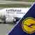Planes of German airline Lufthansa are seen at the Tegel airport in Berlin