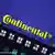 Logo of Continental on top of building taken at an downwards angle