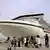 Tourists disembark cruise ship Princess Sapphire in Shanghai