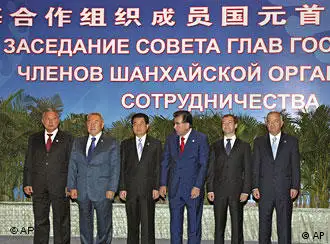 From left, Kyrgyzstan's, President Kurmanbek Bakiyev; Kazakhstan's, President Nursultan Nazarbayev; China's President Hu Jintao; Tajikistan's, President Emomali Rakhmon; Russia's, President Dmitry Medvedev and Uzbekistan's, President Islam Karimov pose for a photo during the Shanghai Cooperation Organization, summit in Dushanbe, Tajikistan, Thursday, Aug. 28, 2008. Russia is asking China and other members of an Asian security group to support its military actions in Georgia. (AP Photo/RIA-Novosti, Mikhail Klimentyev, Presidential Press Service)