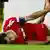 Ümit Özat'ın maç sırasında rahatsızlığı Köln taraftarlarını üzmüştü