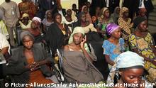 In this photo released by the Nigeria State House, freed Chibok school girls sit during a meeting with Nigeria Vice President Yemi Osinbajo, in Abuja,, Nigeria, Thursday, Oct. 13, 2016. Twenty-one of the Chibok schoolgirls kidnapped by Boko Haram more than two years ago were freed Thursday in a swap for detained leaders of the Islamic extremist group â€” the first release since nearly 300 girls were taken captive in a case that provoked international outrage. (Sunday Aghaeze/Nigeria State House via AP)