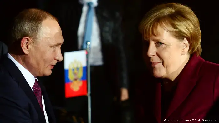 Angela Merkel und Wladimir Putin in Berlin (picture-alliance/AA/M. Gambarini)