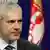 Serbian President Boris Tadic listens to questions during a media conference