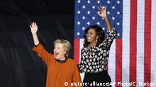 Democratic presidential candidate Hillary Clinton and first lady Michelle Obama wave to supporters during a campaign rally in Winston-Salem, N.C., Thursday, Oct. 27, 2016. (AP Photo/Chuck Burton)
(c) picture-alliance/AP Photo/C. Burton
