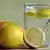 lemons and glass with water