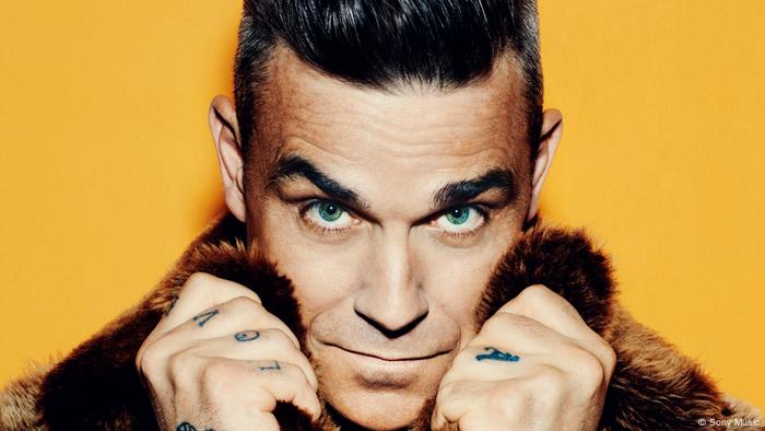 overdracht Weigering Geometrie Robbie Williams′ new album is a blast from the past | Music | DW |  04.11.2016
