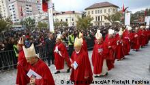 Catholic cardinals enter the cathedral in the northern city of Shkoder, Albania, which celebrated the beatification of 38 Catholic martyrs executed or tortured to death during the former communist regime Saturday, Nov. 5, 2016. Albanians celebrated their beatification after Pope Francis had officially recognized as martyrs Archbishop Vincens Prenushi and 37 other priests who died in prison or were murdered in 1945-1974 by the late communist dictator Enver Hoxha's regime. (AP Photo/Hektor Pustina) |
