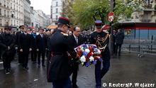 13.11.2016 +++
French President Francois Hollande and Paris Mayor Anne Hidalgo lay a wreath of flowers as they unveil a commemorative plaque next to the A La Bonne Biere cafe and the Rue de la Fontaine au Roi street, in Paris, France, November 13, 2016, during a ceremony held for the victims of last year's Paris attacks which targeted the Bataclan concert hall as well as a series of bars and killed 130 people. REUTERS/Philippe Wojazer