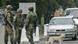 Russian soldiers at a checkpoint Russian soldiers at a checkpoint