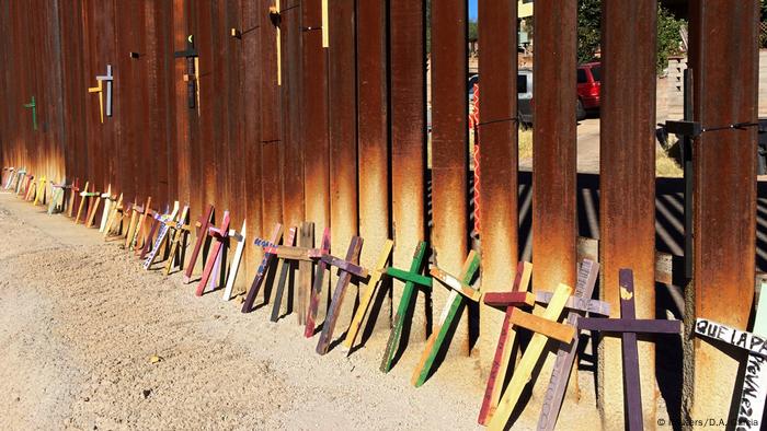 Wooden crosses on the border between Mexico and the United States.