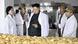 Nordkorea Kim Jong Un in einer Keksfabrik Nordkorea Kim Jong Un in einer Keksfabrik