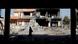 A man walks past a buildign destroyed during clashes between Iraqi forces and 'Islamic State' fighters A man walks past a buildign destroyed during clashes between Iraqi forces and 'Islamic State' fighters