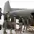 Bundeswehr soldiers board a plane bound for Sudan