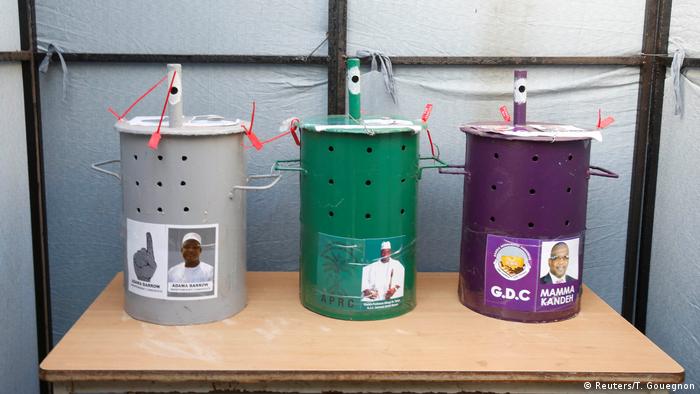 Ballot casting drums with depictions of the candidates are seen during the presidential election in Gambia's 2016 elections