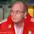 Uli Hoeneß, der Manager des FC Bayern München sitzt mit rotem Kopf auf der Trainerbank des deutschen Fußball-Meisters. Quelle: dpa