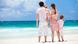 Familie mit zwei Kindern geniesst den Ausblick am karibischen Sandstrand, family with two children admiring the view on Caribbean beach Familie mit zwei Kindern geniesst den Ausblick am karibischen Sandstrand, family with two children admiring the view on Caribbean beach