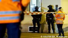 Police stand outside an Islamic center in central Zurich, Switzerland December 19, 2016. REUTERS/Arnd Wiegmann 