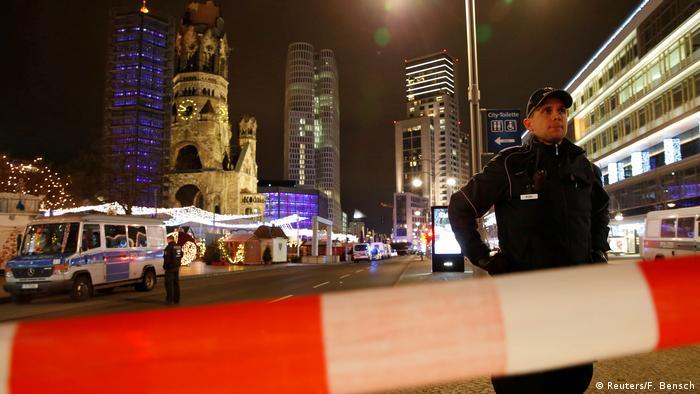 In this December 2016 file photo, a police officer stands near the scene of the Breitscheidplatz Christmas market terrorist attack 