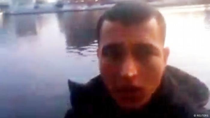 An image grab from a short 'selfie' video clip from a social media website purportedly shows Anis Amri, the Tunisian suspect of the Berlin Christmas market attack, at an unknown location (REUTERS)
