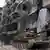 Ein Panzer der syrischen Armee im zurückeroberten und zerstörten Alepp