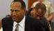 O.J. Simpson wird von einem Sicherheitsbeamten abgeführrt (3.10.2008, Quelle: AP) O.J. Simpson wird von einem Sicherheitsbeamten abgeführrt (3.10.2008, Quelle: AP)