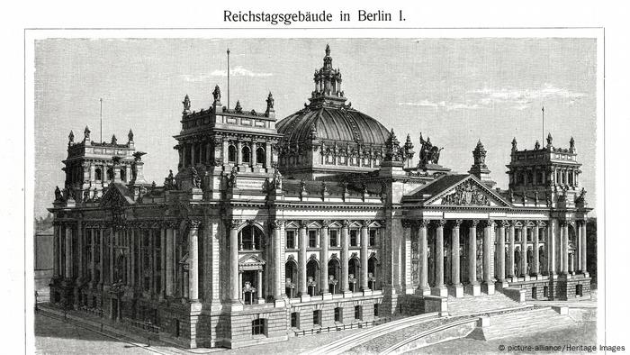 A black-and-white photograph showing the Reichstag building