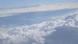 Wolken auf 10.000 Metern Höhe, von einem Flugzeug aus gesehen (Foto: DW/Hafsa Begum) Wolken auf 10.000 Metern Höhe, von einem Flugzeug aus gesehen (Foto: DW/Hafsa Begum)