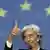 France's Finance Minister and President of the EU Council Christine Lagarde shows thumb up during a media conference at the EU finance ministers meeting in Luxembourg, Tuesday, Oct. 7, 2008. The EU governments, seeking to restore confidence to jittery markets and consumers, debated coordinated steps Tuesday to save troubled banks and mortgage lenders from drowning in the credit crisis that has spread from the United States to Europe. (AP Photo/Yves Logghe)