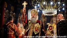 Macedonian Christian Orthodox Archbishop Stefan holds a holy Christmas liturgy in St. Clement's Orthodox Cathedral church in Skopje, Macedonia, Tuesday Jan. 7, 2014. Macedonian Christian Orthodox believers celebrate Christmas according to the Julian calendar. (AP Photo/Boris Grdanoski) |