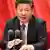 Präsident  Xi Jinping vor Mikrofonen  (Foto: picture-alliance/Photoshot/Li Tao)